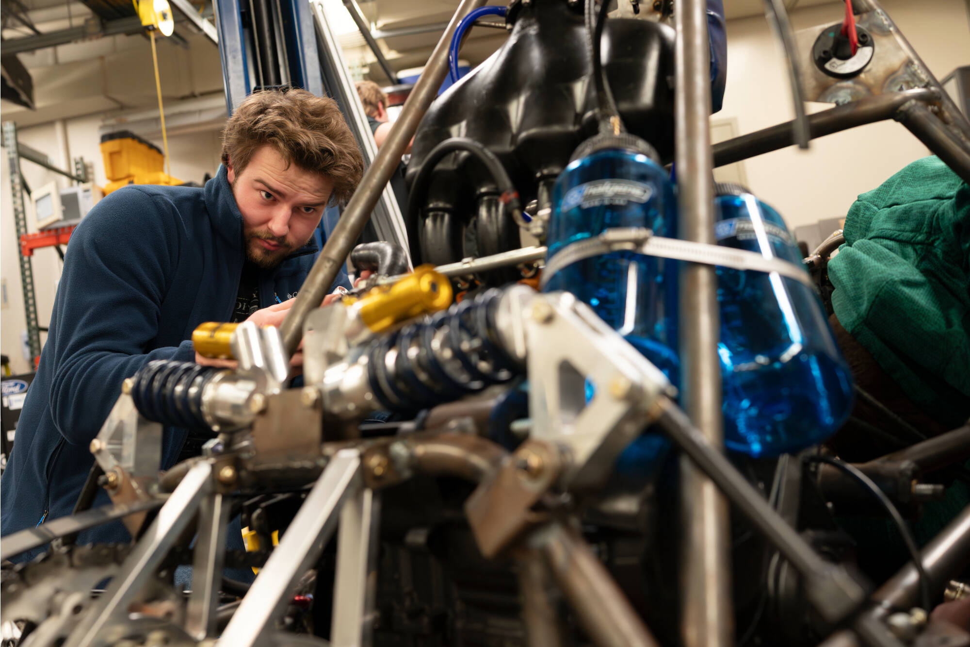 An engineer looking at a frame.